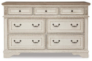 Realyn King Upholstered Panel Bed, Dresser, Chest and Nightstand