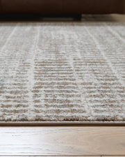 Fuadwick 7'10" x 10' Area Rug