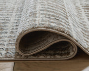 Fuadwick 5'3" x 7' Area Rug